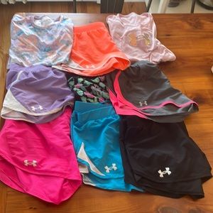Youth Girls XL Under Armour lot. 7 pairs of shorts & 2 shirts.
